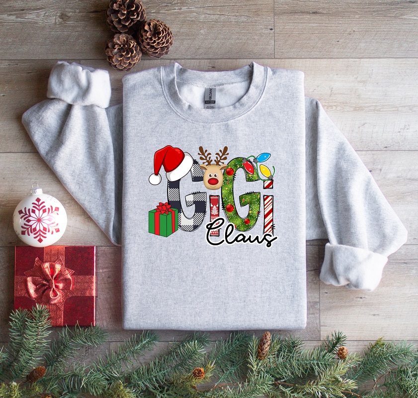 Gigi Claus Sweatshirt-each letter of mama is an adorable Christmas design on a lightweight and comfortable sweatshirt