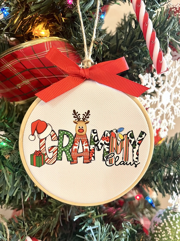 Grammy Claus Ornament-4 inch wood hoop with dtf design printed on durable canvas finished with red grosgrain ribbon