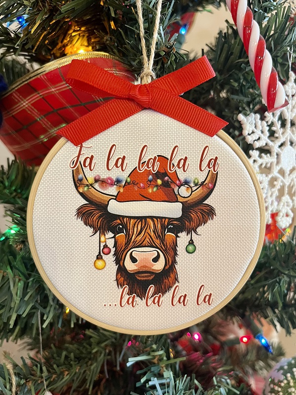 Highland Cow Falalala Ornament-4 inch wood hoop with design dtf on to durable canvas fabric finished with a red grosgrain ribbon