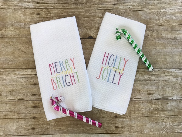 Embroidered Christmas Tea Towel-Waffle weave towel with holly and jolly or merry and bright letters embroidered in multi color threads