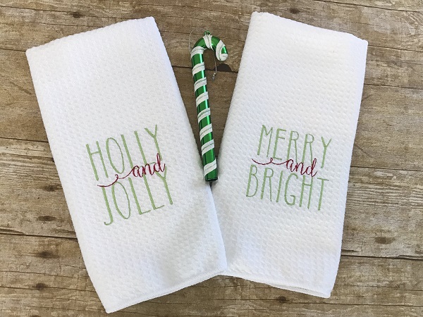 Embroidered Holiday Tea Towel-Waffle weave towel with holly and jolly or merry and bright embroider in green letters
