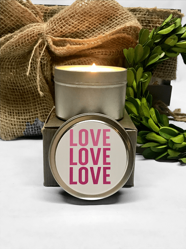 Love Candle Collection-4 ounce travel tin candle scented in vanilla noir or amber Patchouli with your choice of customized sticker perfect for your loved one