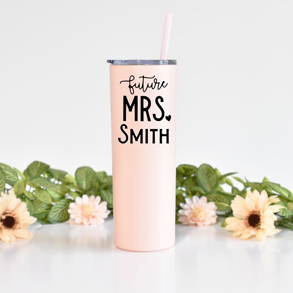 Future Mrs. Skinny Tumbler-20 ounce insulated tumbler in glitter blush personalized with Future Mrs. and their new last name in black vinyl