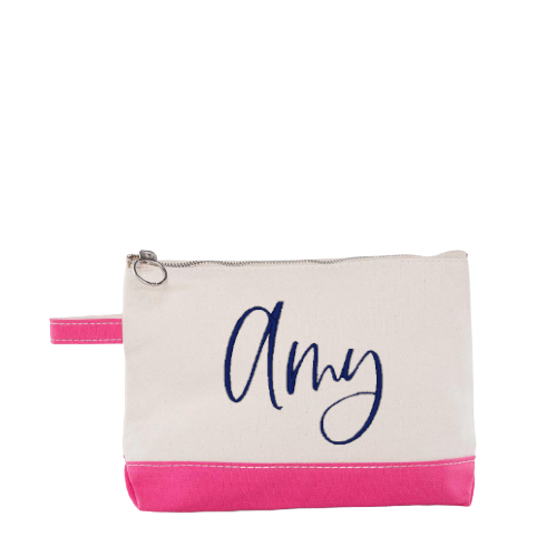 Personalized Makeup Bags-in pink with Amy embroidered in stillness font in navy blue thread